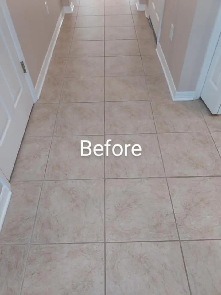 Hallway tile floor before cleaning with traffic soiling