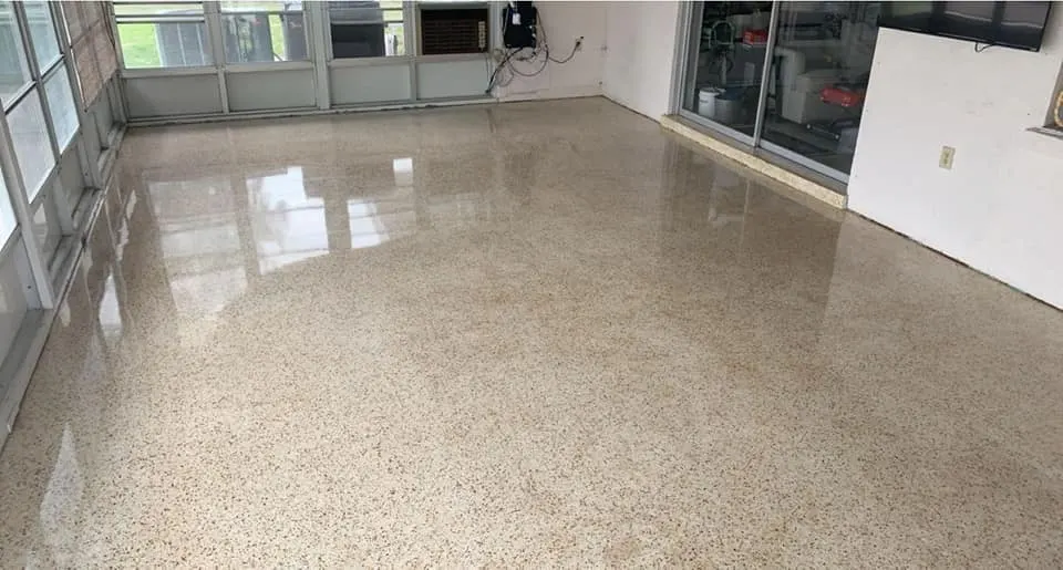 Freshly polished terrazzo hallway reflecting the windows